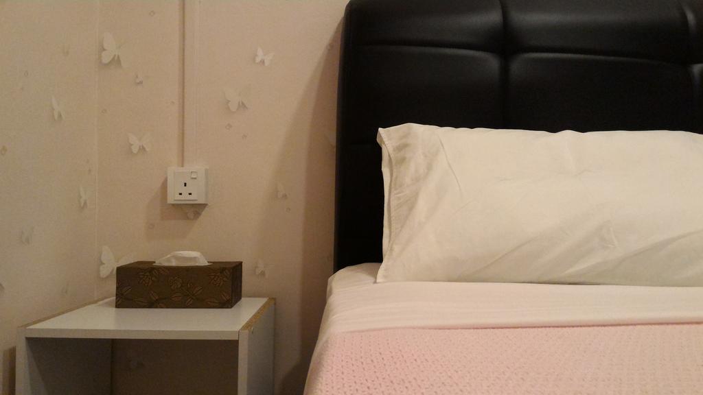 Nancii Guesthouse Malacca Værelse billede